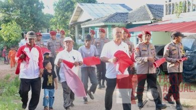 Ditreskrimsus Polda Kepri Bagikan 700 Bendera Dan Bansos Dalam Acara Semangat Nasionalisme