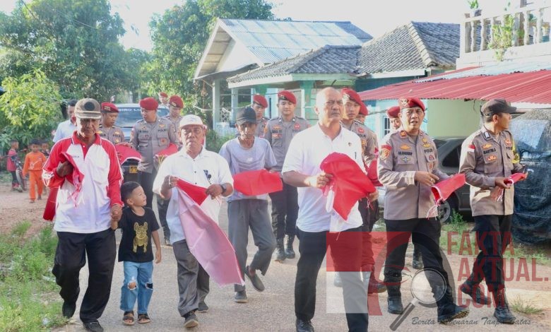 Ditreskrimsus Polda Kepri Bagikan 700 Bendera Dan Bansos Dalam Acara Semangat Nasionalisme